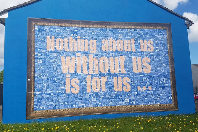 Belfast Troubles Murals Street Art and Peace Wall Walking Tour - The International Mural Wall on Divis Street