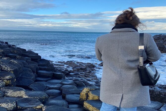 Giant's Causeway and Belfast City Murals Tour inc Game of Thrones Dark Hedges - Guides, coaches, and the value of the transport