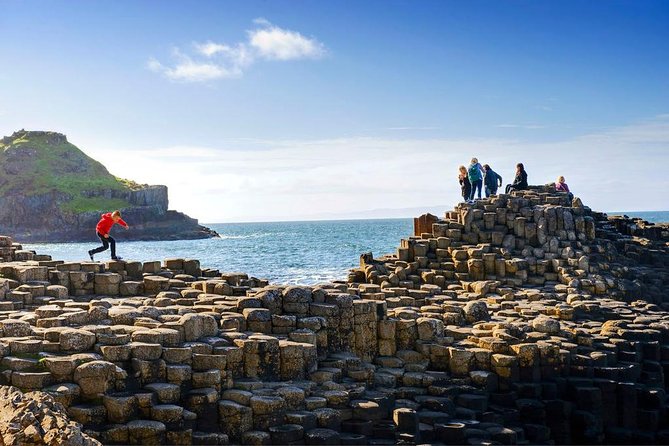 Giant's Causeway and more including Titanic Experience Ticket Tour from Belfast - Dunluce Castle and the North Atlantic road
