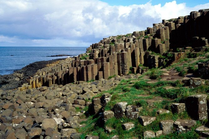 Luxury Tours Belfast. Full day Private Hire Tour for 2- 6 people - Dunluce Castle closes the day with a dramatic view